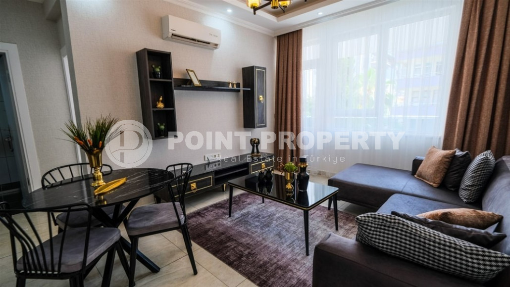 Уютные меблированные апартаменты планировкой 1+1, 55 м2, в самом центре Аланьи в районе самого известного пляжа Клеопатры.-id-1113-фото-7