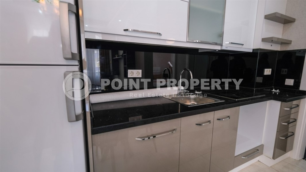 Уютные меблированные апартаменты планировкой 1+1, 55 м2, в самом центре Аланьи в районе самого известного пляжа Клеопатры.-id-1113-фото-10