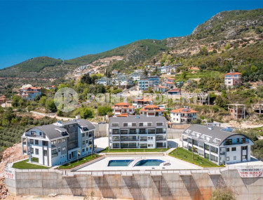 Квартира  1+1 с панорамным видом на море и крепость в центральном районе Алании – Бекташ-id-1114-фото-2