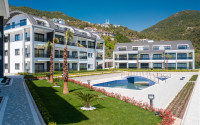Apartment 1+1 with panoramic views of the sea and the fortress in the central area of Alanya - Bektas-id-1114-photo-3