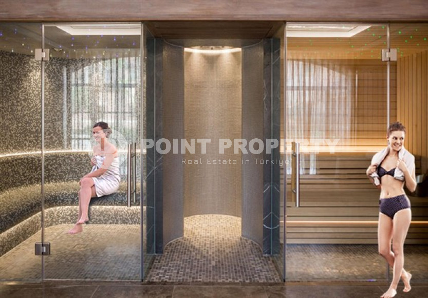 One and two bedroom apartments, 48-97m², in a residence under construction in the center of Alanya-id-1812-photo-8