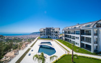 Apartment 1+1 with panoramic views of the sea and the fortress in the central area of Alanya - Bektas-id-1114-photo-4