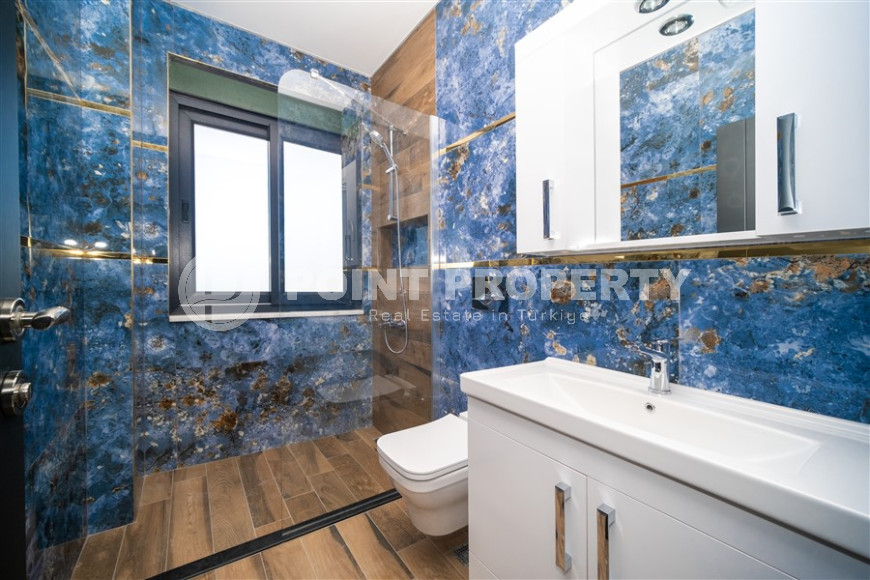 Apartment 1+1 with panoramic views of the sea and the fortress in the central area of Alanya - Bektas-id-1114-photo-11