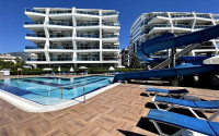 One-bedroom apartment, 55m², in the Oba area, Alanya, in a complex with hotel infrastructure-id-1824-photo-1