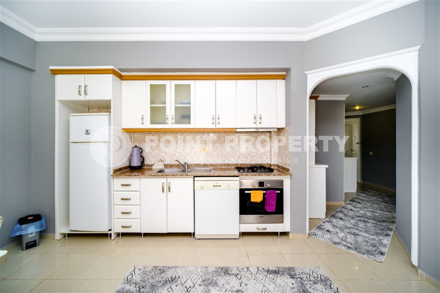 Меблированная двухкомнатная квартира 60 м2 в центре Алании-id-1117-фото-9