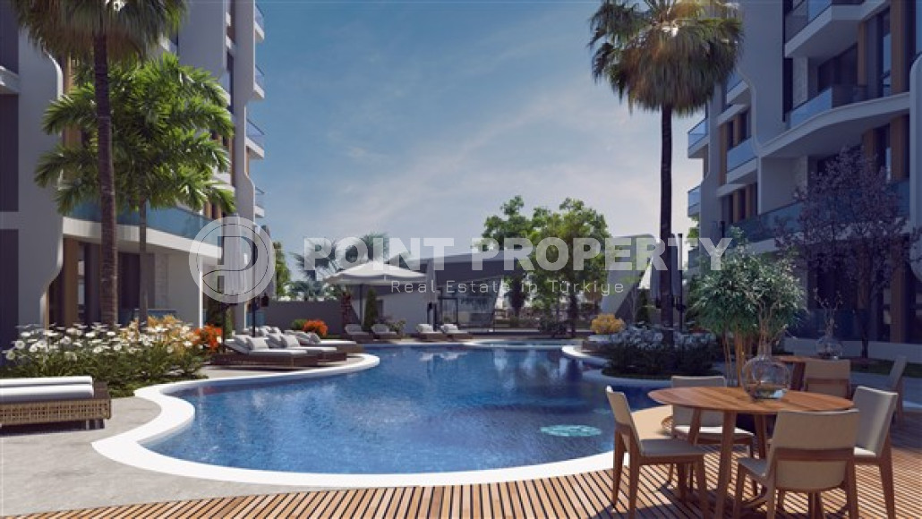 Квартиры с одной спальней, 60м², в строящемся комплексе в элитном районе Анталии -  Лара-id-1826-фото-9