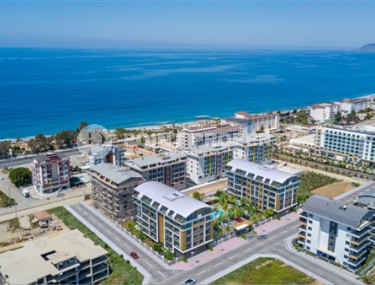 Двухкомнатная квартира, 55м², в комплексе на этапе строительства у моря в Каргыджаке, Алания-id-1829-фото-3