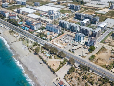 Двухкомнатная квартира, 55м², в комплексе на этапе строительства у моря в Каргыджаке, Алания-id-1829-фото-4