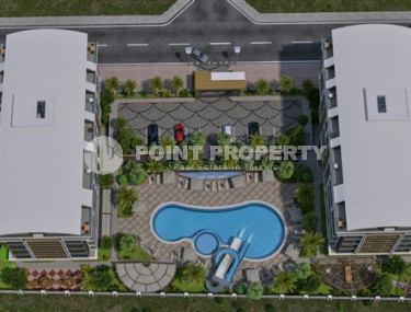 Двухкомнатная квартира, 55м², в комплексе на этапе строительства у моря в Каргыджаке, Алания-id-1829-фото-5