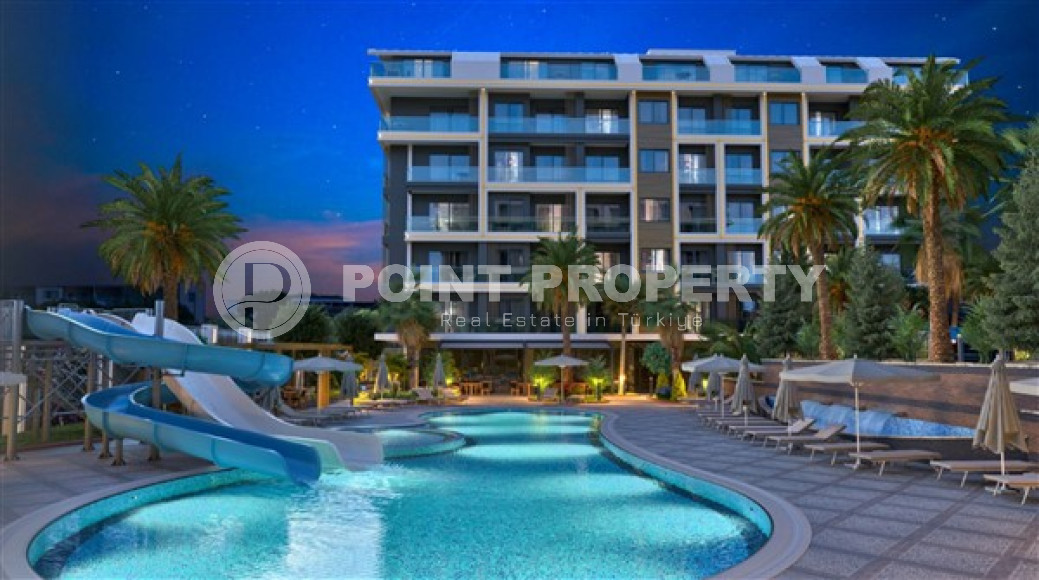 Двухкомнатная квартира, 55м², в комплексе на этапе строительства у моря в Каргыджаке, Алания-id-1829-фото-9