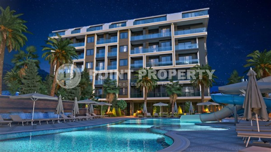 Двухкомнатная квартира, 55м², в комплексе на этапе строительства у моря в Каргыджаке, Алания-id-1829-фото-11