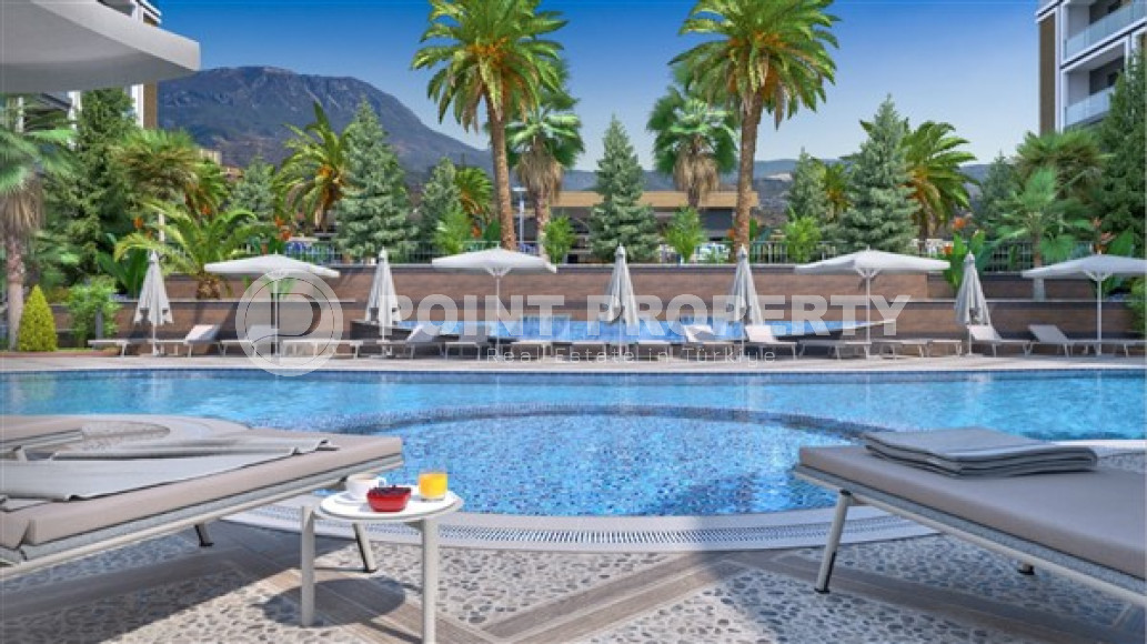 Двухкомнатная квартира, 55м², в комплексе на этапе строительства у моря в Каргыджаке, Алания-id-1829-фото-14