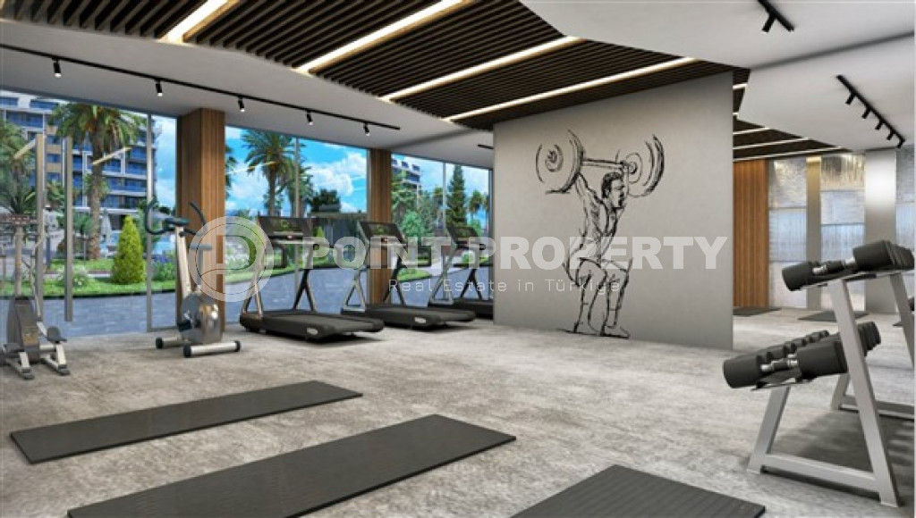 Двухкомнатная квартира, 55м², в комплексе на этапе строительства у моря в Каргыджаке, Алания-id-1829-фото-27