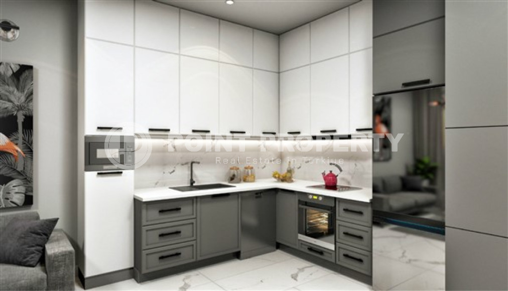 Двухкомнатная квартира, 55м², в комплексе на этапе строительства у моря в Каргыджаке, Алания-id-1829-фото-30