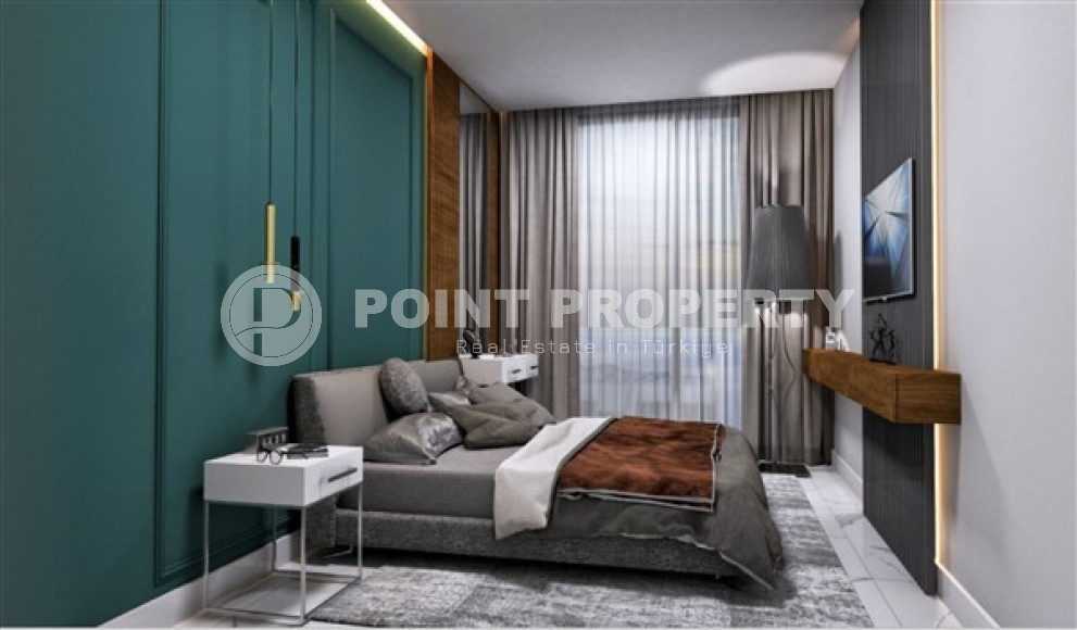 Двухкомнатная квартира, 55м², в комплексе на этапе строительства у моря в Каргыджаке, Алания-id-1829-фото-31