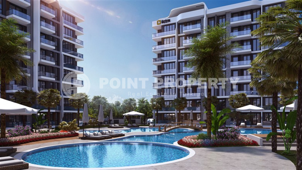 Two-room apartments, 75 m², in a luxury complex under construction in the Antalya area - Lara-id-1832-photo-4