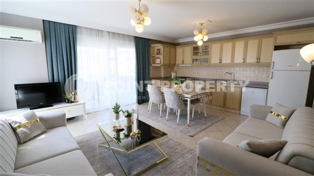 Furnished three-room apartment, 110m², on the main street of Mahmutlar with sea and mountain views-id-1835-photo-2