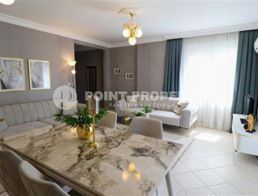 Furnished three-room apartment, 110m², on the main street of Mahmutlar with sea and mountain views-id-1835-photo-3