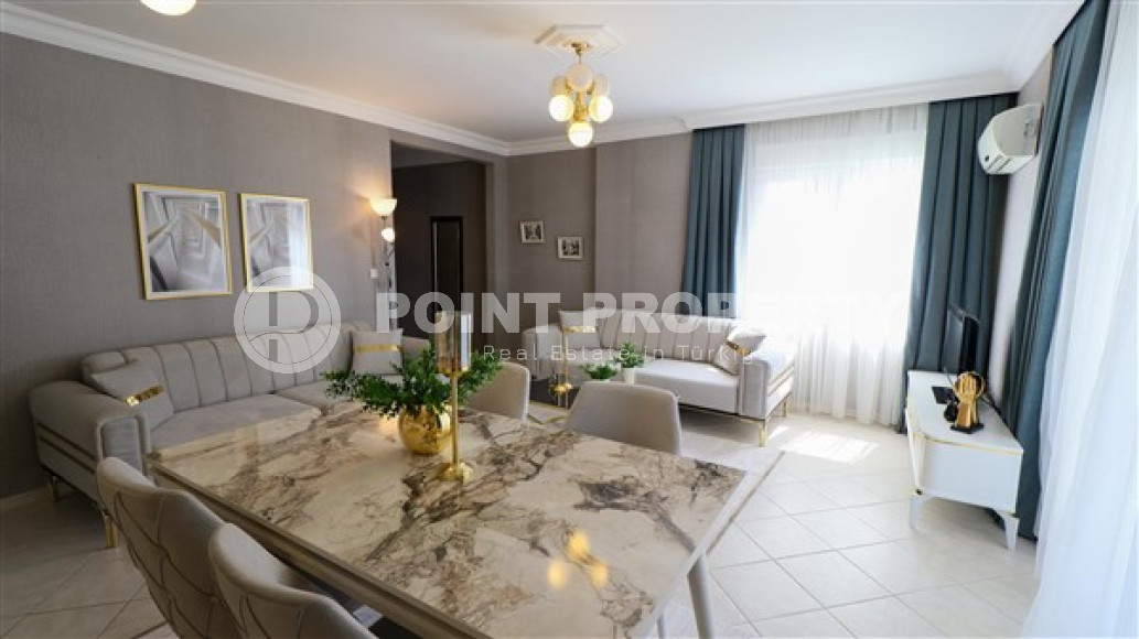 Furnished three-room apartment, 110m², on the main street of Mahmutlar with sea and mountain views-id-1835-photo-3