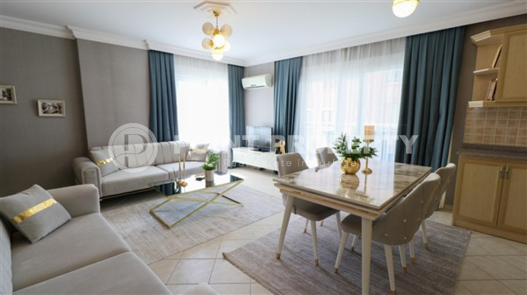 Furnished three-room apartment, 110m², on the main street of Mahmutlar with sea and mountain views-id-1835-photo-4
