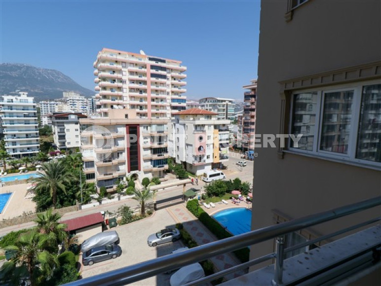 Furnished three-room apartment, 110m², on the main street of Mahmutlar with sea and mountain views-id-1835-photo-10