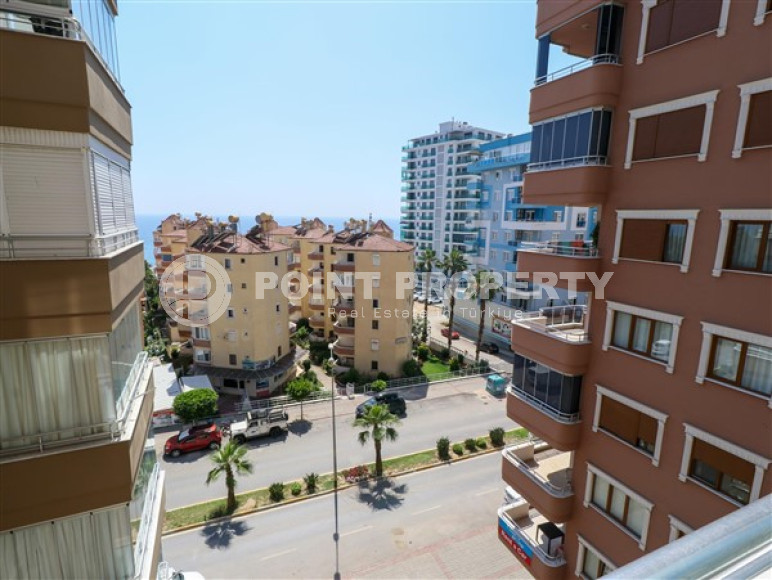 Furnished three-room apartment, 110m², on the main street of Mahmutlar with sea and mountain views-id-1835-photo-11