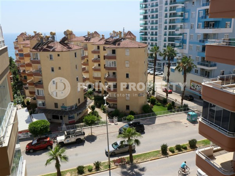Furnished three-room apartment, 110m², on the main street of Mahmutlar with sea and mountain views-id-1835-photo-12