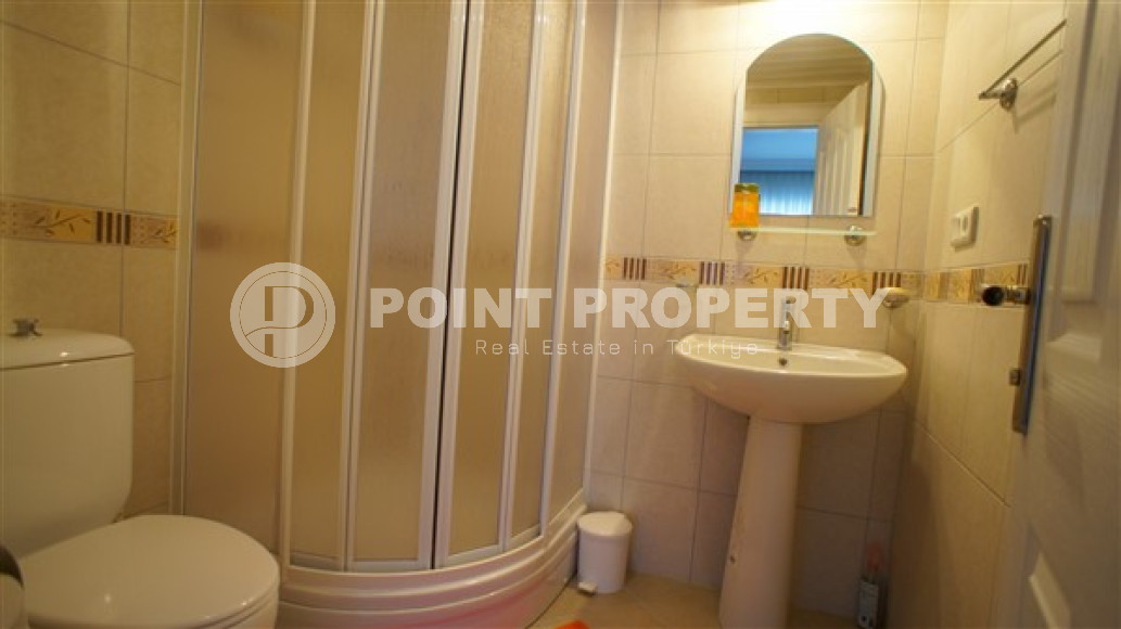 Furnished three-room apartment, 110m², on the main street of Mahmutlar with sea and mountain views-id-1835-photo-14