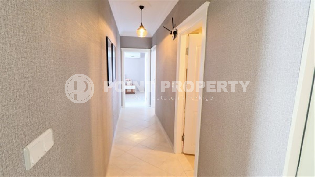 Furnished three-room apartment, 110m², on the main street of Mahmutlar with sea and mountain views-id-1835-photo-15