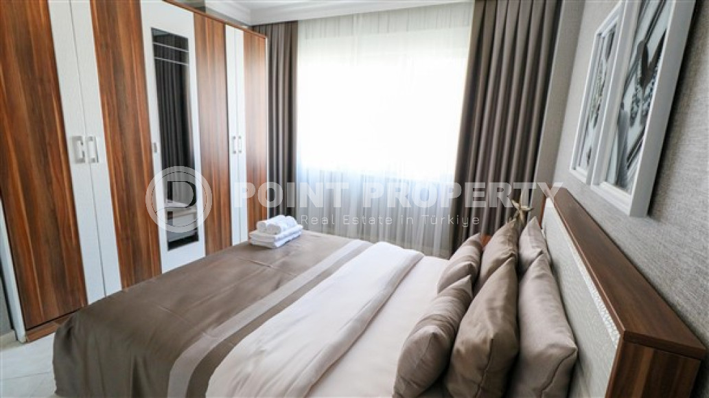 Furnished three-room apartment, 110m², on the main street of Mahmutlar with sea and mountain views-id-1835-photo-17