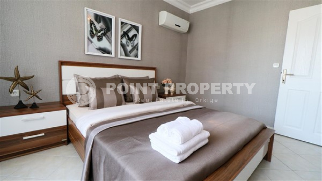 Furnished three-room apartment, 110m², on the main street of Mahmutlar with sea and mountain views-id-1835-photo-18