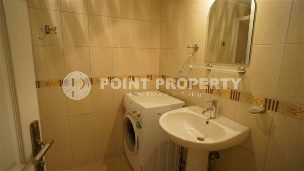 Furnished three-room apartment, 110m², on the main street of Mahmutlar with sea and mountain views-id-1835-photo-19