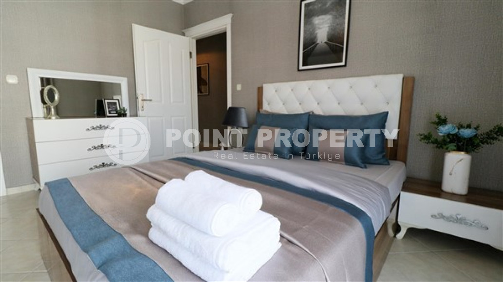 Furnished three-room apartment, 110m², on the main street of Mahmutlar with sea and mountain views-id-1835-photo-20