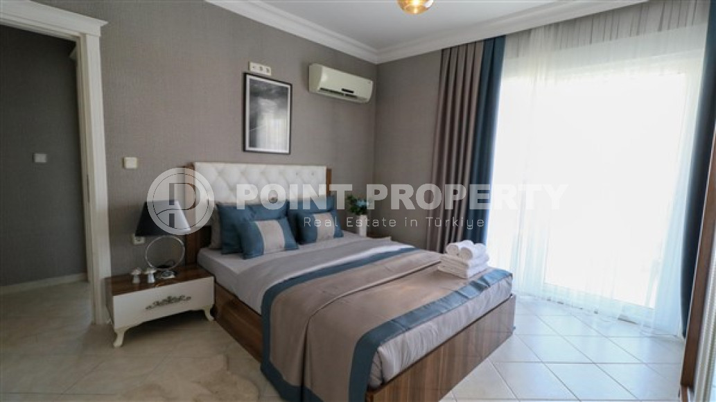 Furnished three-room apartment, 110m², on the main street of Mahmutlar with sea and mountain views-id-1835-photo-21