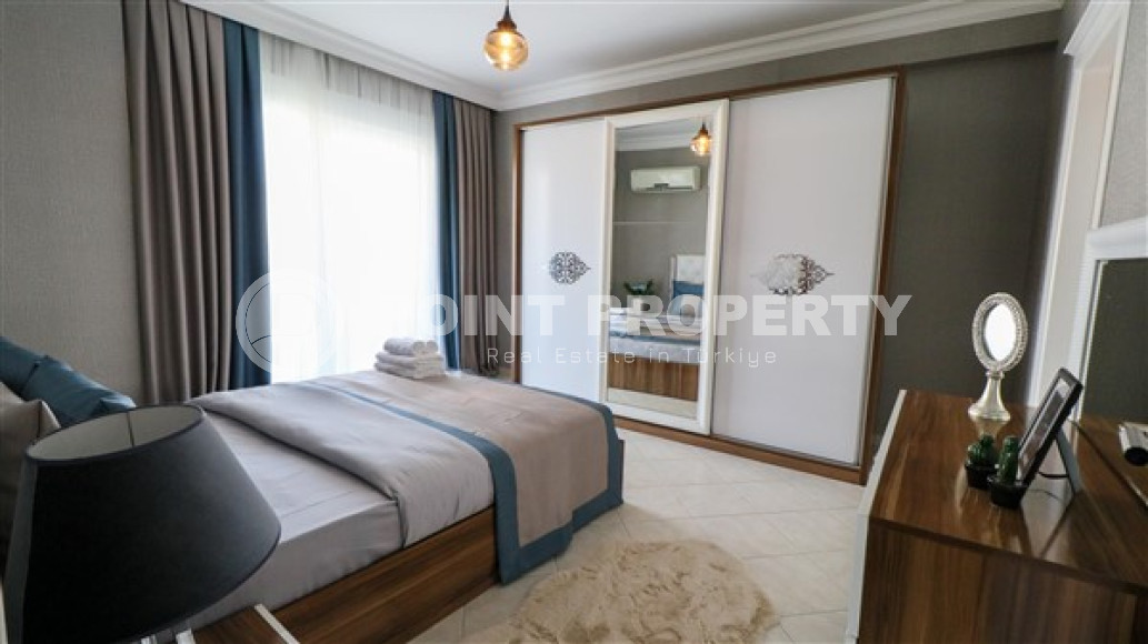 Furnished three-room apartment, 110m², on the main street of Mahmutlar with sea and mountain views-id-1835-photo-23