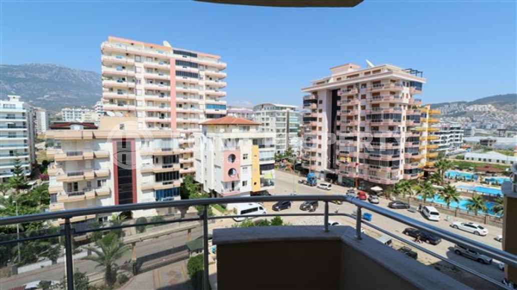 Furnished three-room apartment, 110m², on the main street of Mahmutlar with sea and mountain views-id-1835-photo-24