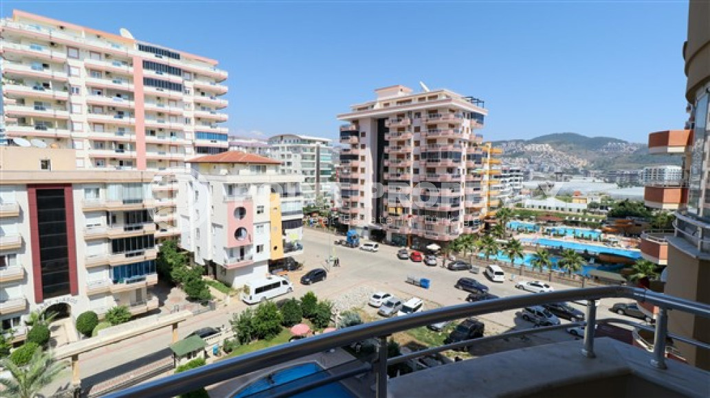 Furnished three-room apartment, 110m², on the main street of Mahmutlar with sea and mountain views-id-1835-photo-26