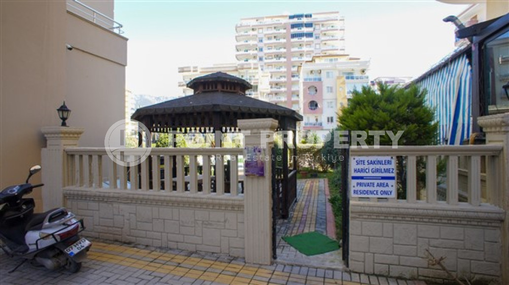 Furnished three-room apartment, 110m², on the main street of Mahmutlar with sea and mountain views-id-1835-photo-30