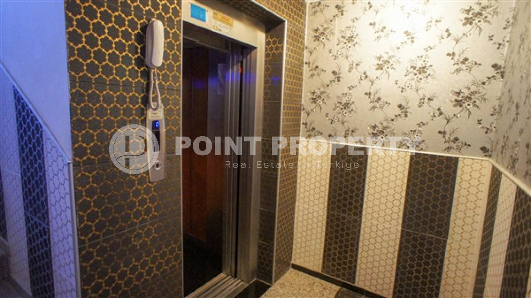 Furnished three-room apartment, 110m², on the main street of Mahmutlar with sea and mountain views-id-1835-photo-38