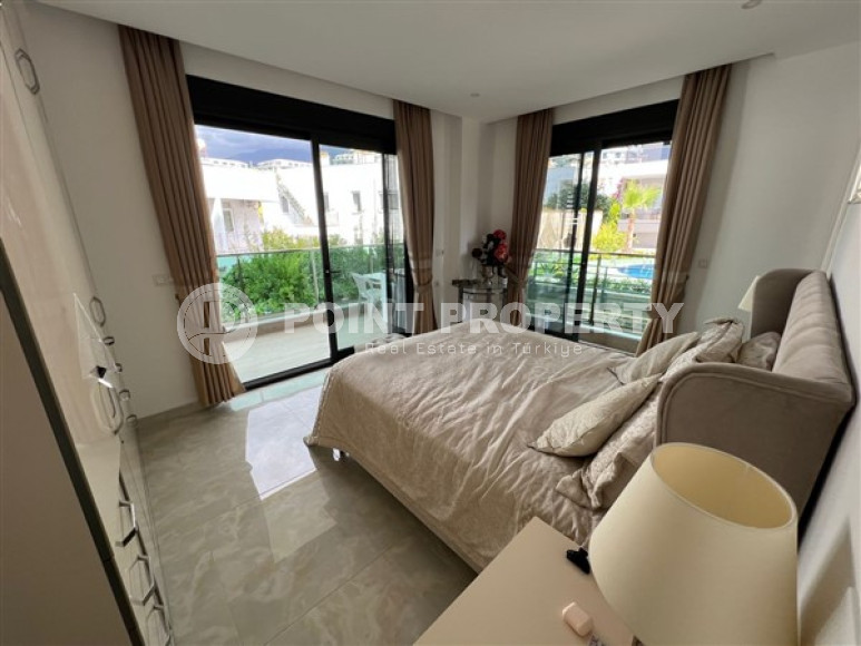 Элегантная квартира с двумя спальнями, 110м², на первой береговой линии в Каргыджаке, Алания-id-1844-фото-9