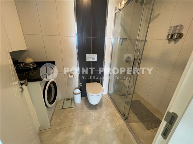 Элегантная квартира с двумя спальнями, 110м², на первой береговой линии в Каргыджаке, Алания-id-1844-фото-11