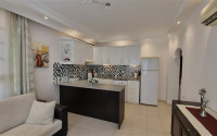 Furnished three-room apartment, 80m², in a residence with a swimming pool in Oba, Alanya-id-1849-photo-5