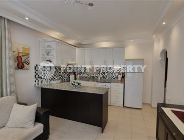 Furnished three-room apartment, 80m², in a residence with a swimming pool in Oba, Alanya-id-1849-photo-5