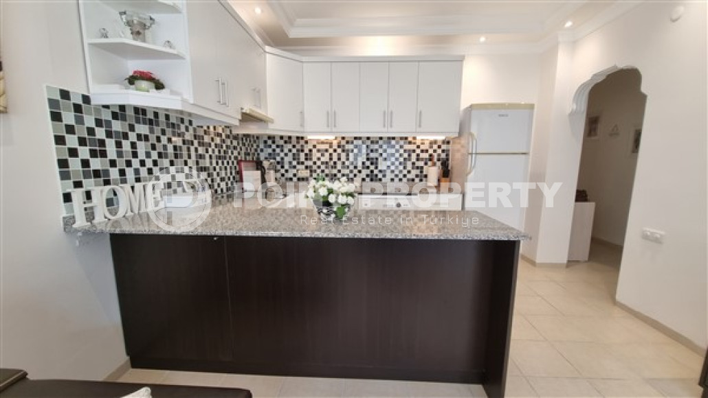 Furnished three-room apartment, 80m², in a residence with a swimming pool in Oba, Alanya-id-1849-photo-8