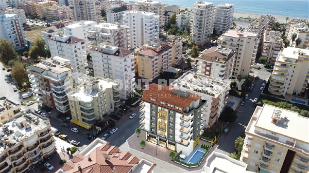 Новый пентхаус двумя спальнями, 148м², в 200м от побережья в Махмутларе, Алания-id-1860-фото-2