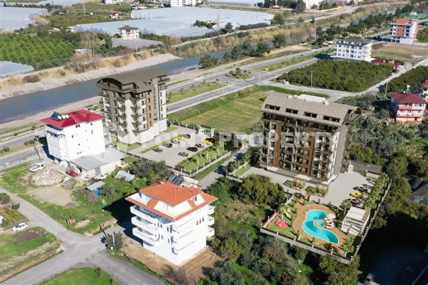 От строительной компании: инвестиционный проект с хорошей инфраструктурой в районе Алании - Демирташ-id-1865-фото-6