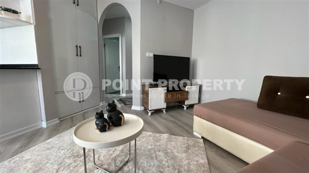 Furnished two-room apartment, 65m², 300m from the sea in Oba, Alanya, at a competitive price-id-1867-photo-11