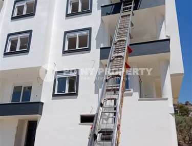 Двухкомнатная квартира, 50м², в доме городского типа на стадии строительства в районе Газипаша, Алания-id-1870-фото-3