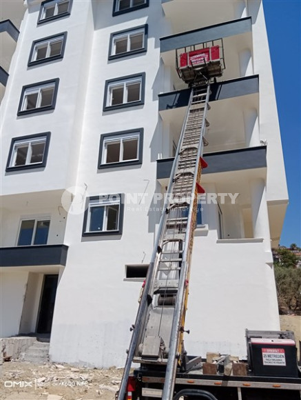 Двухкомнатная квартира, 50м², в доме городского типа на стадии строительства в районе Газипаша, Алания-id-1870-фото-3