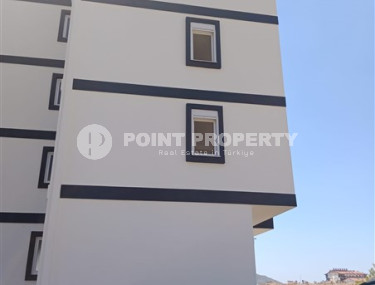 Двухкомнатная квартира, 50м², в доме городского типа на стадии строительства в районе Газипаша, Алания-id-1870-фото-4